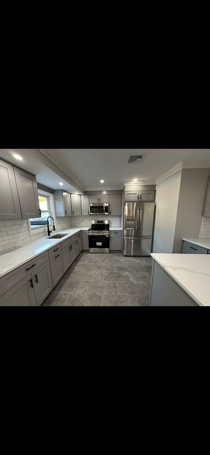 Grey shaker island, quartz tops — A&J Cabinet Studio install